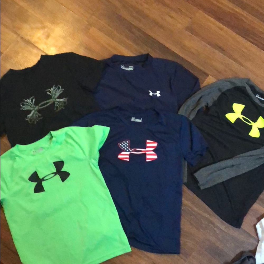 Under Armour shirts. Size 7 and youth small.